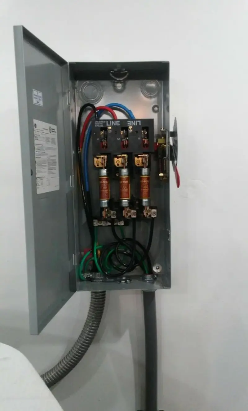 Three-phase disconnect switch installed for Smoke Detector Installation in Casselberry